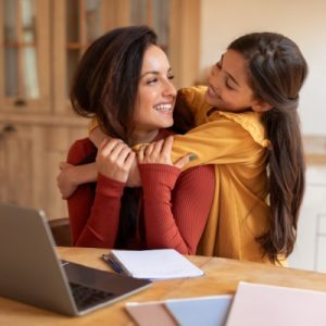 woman using technology to search cost of caregiving information